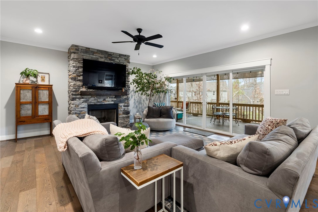 15060 Dordon Lane Midlothian, VA 23112 - Photo 7 of 35 a living room with furniture fireplace and a flat screen tv