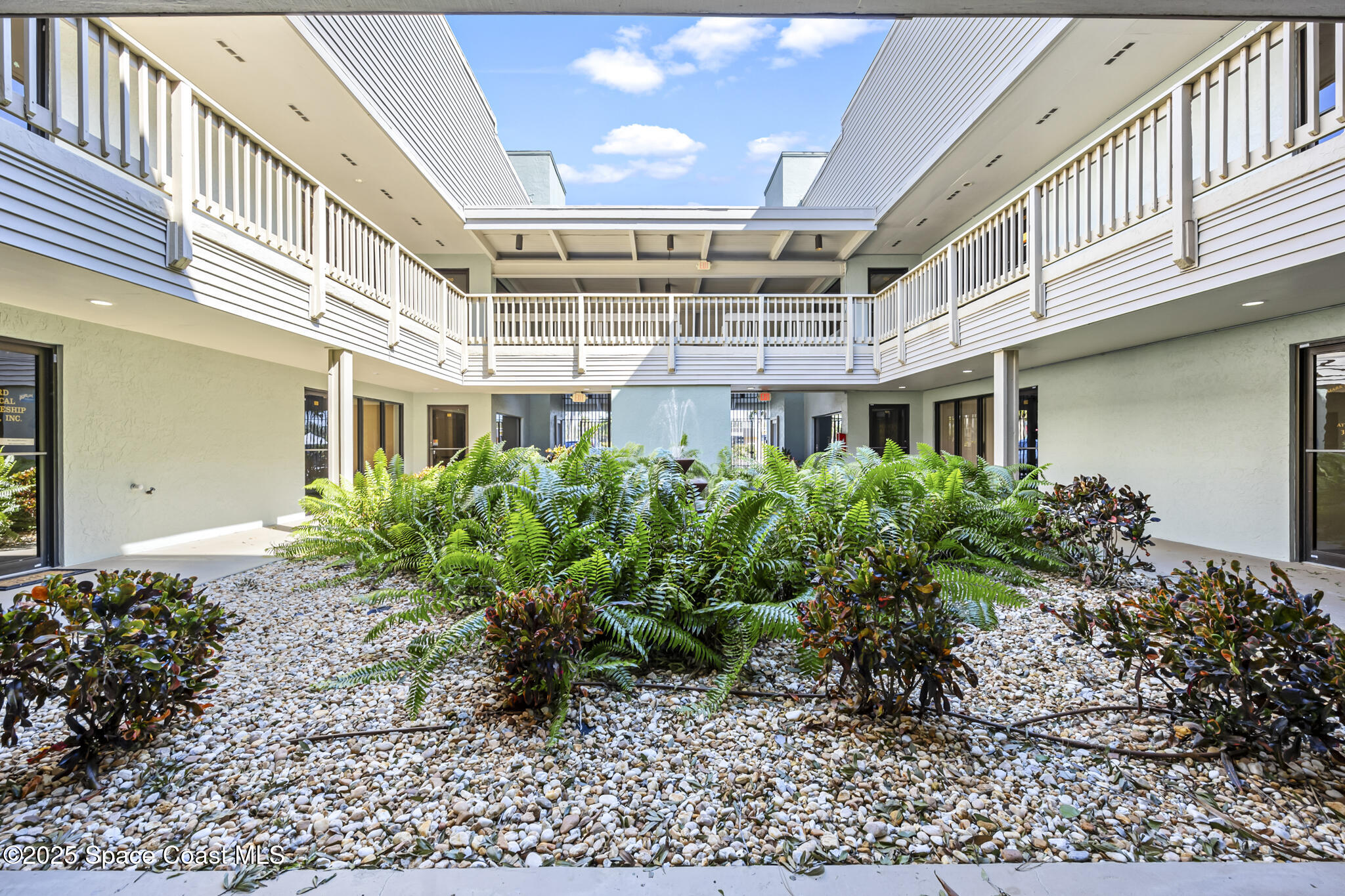 700 North Wickham Road, Unit 109 Melbourne, FL 32935 - Photo 3 of 13 a view of a building