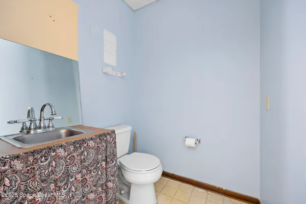 a bathroom with a sink and a toilet