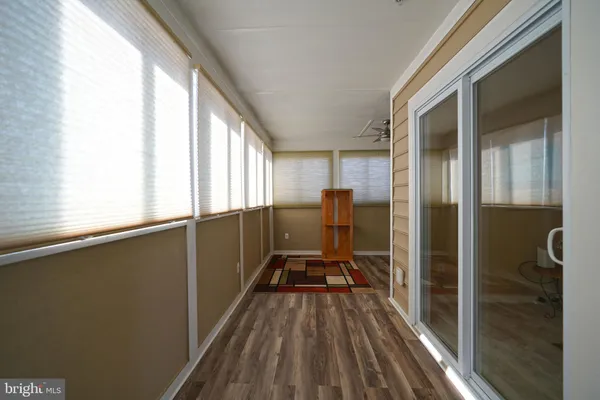 a view of a balcony from a hallway