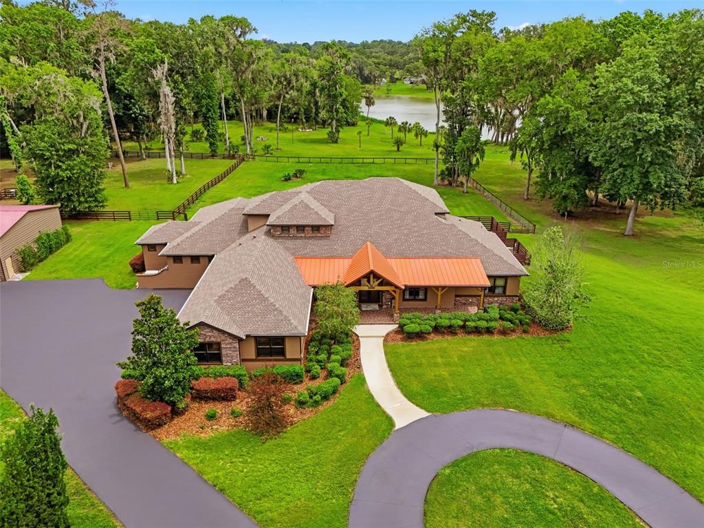 855 Southeast 87th Street Ocala, FL 34480 - Photo 72 of 79 an aerial view of a house with garden