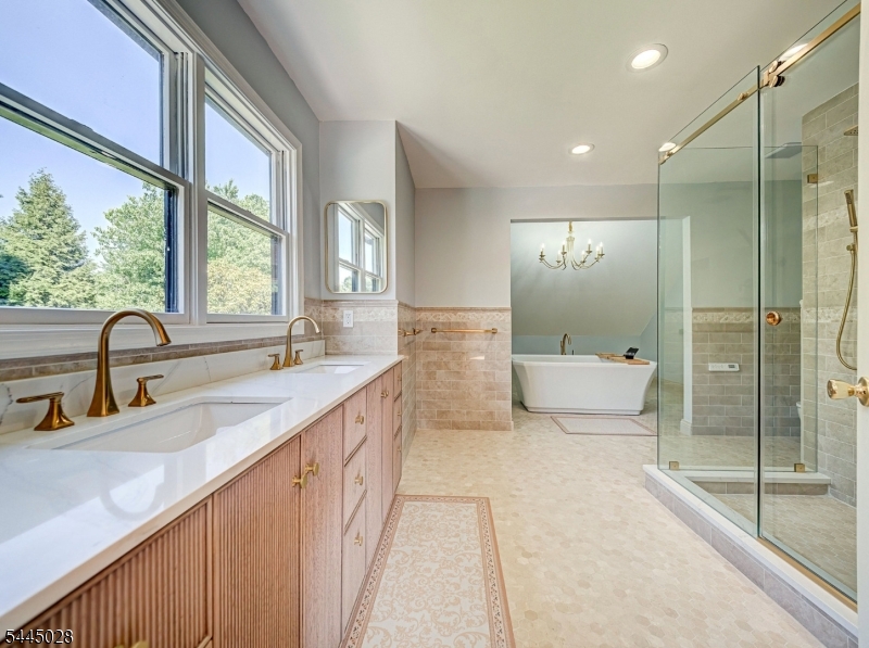 126 Blackwell Road Pennington, NJ 08534 - Photo 23 of 44 a spacious bathroom with a double vanity sink a large mirror and shower