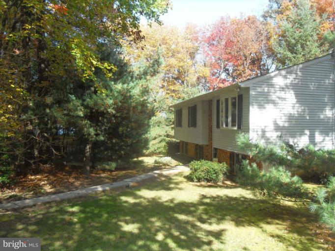 2921 Warehime Road Manchester, MD 21102 - Photo 1 of 30 a front view of a house with a yard
