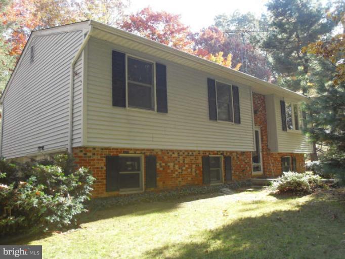 2921 Warehime Road Manchester, MD 21102 - Photo 6 of 30 a front view of a house with a yard