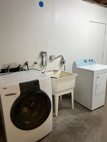 a view of a house with wooden walls