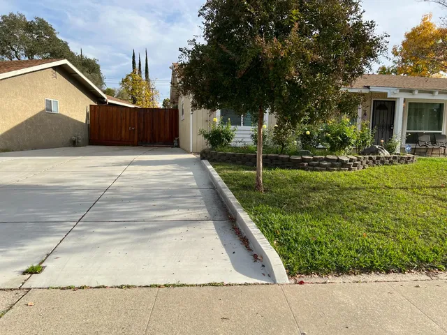 a house view with a garden space
