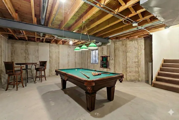 a room with table and chairs