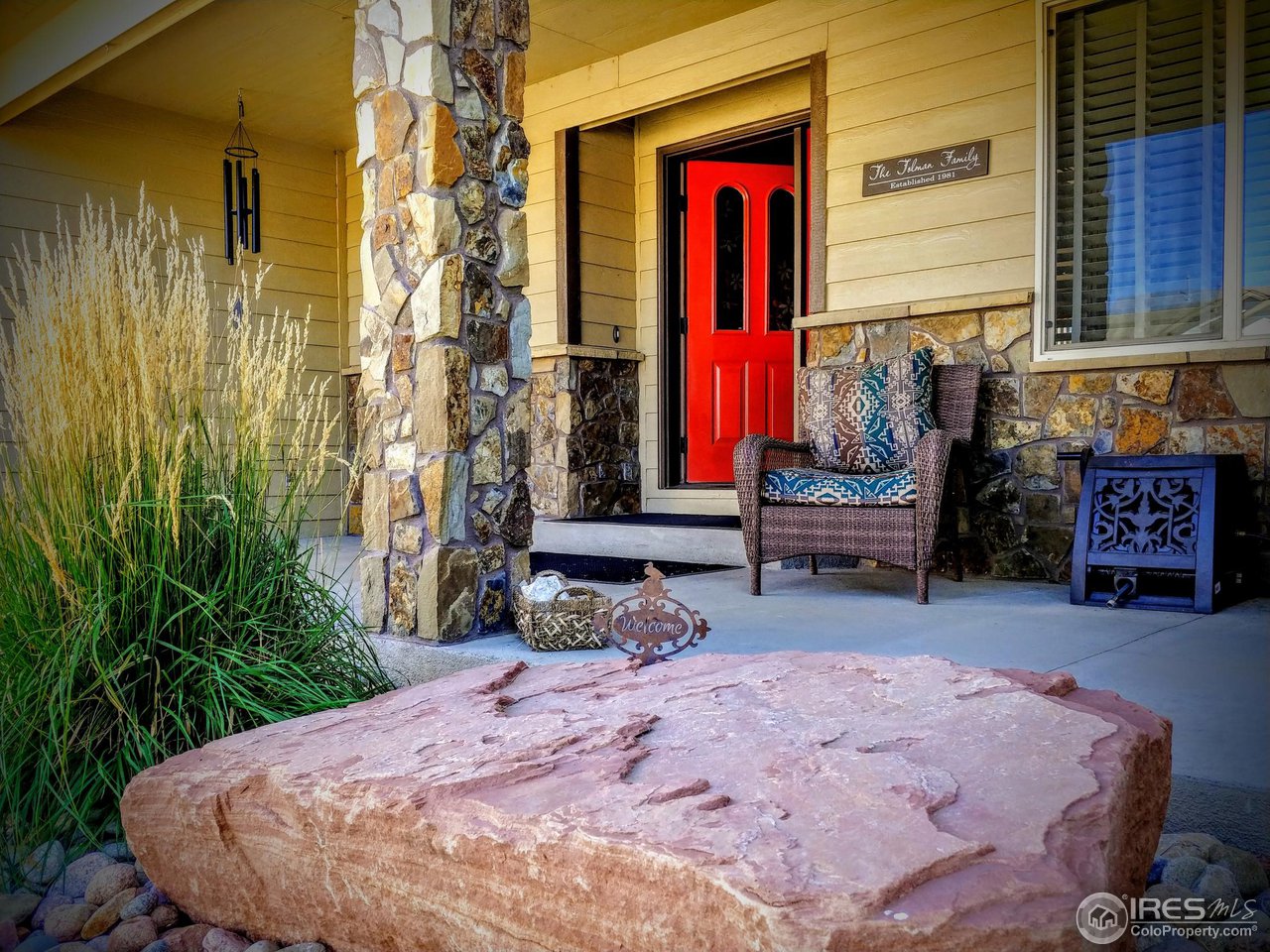 333 Braveheart Road Johnstown, CO 80534 - Photo 1 of 32 Relax on this restful front porch