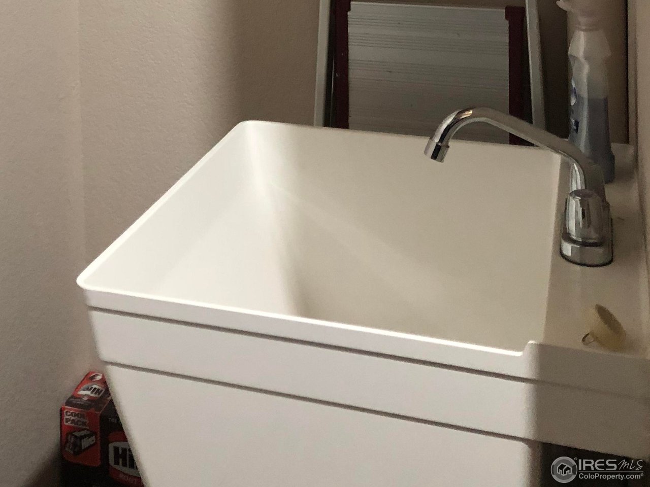 333 Braveheart Road Johnstown, CO 80534 - Photo 24 of 32 Sink in Laundry room