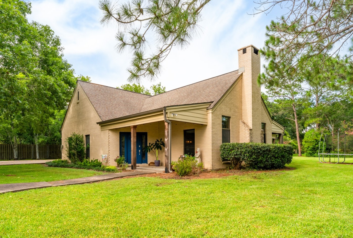 2210 Rita Street El Campo, TX 77437 - Photo 1 of 22 a view of a house with a swimming pool