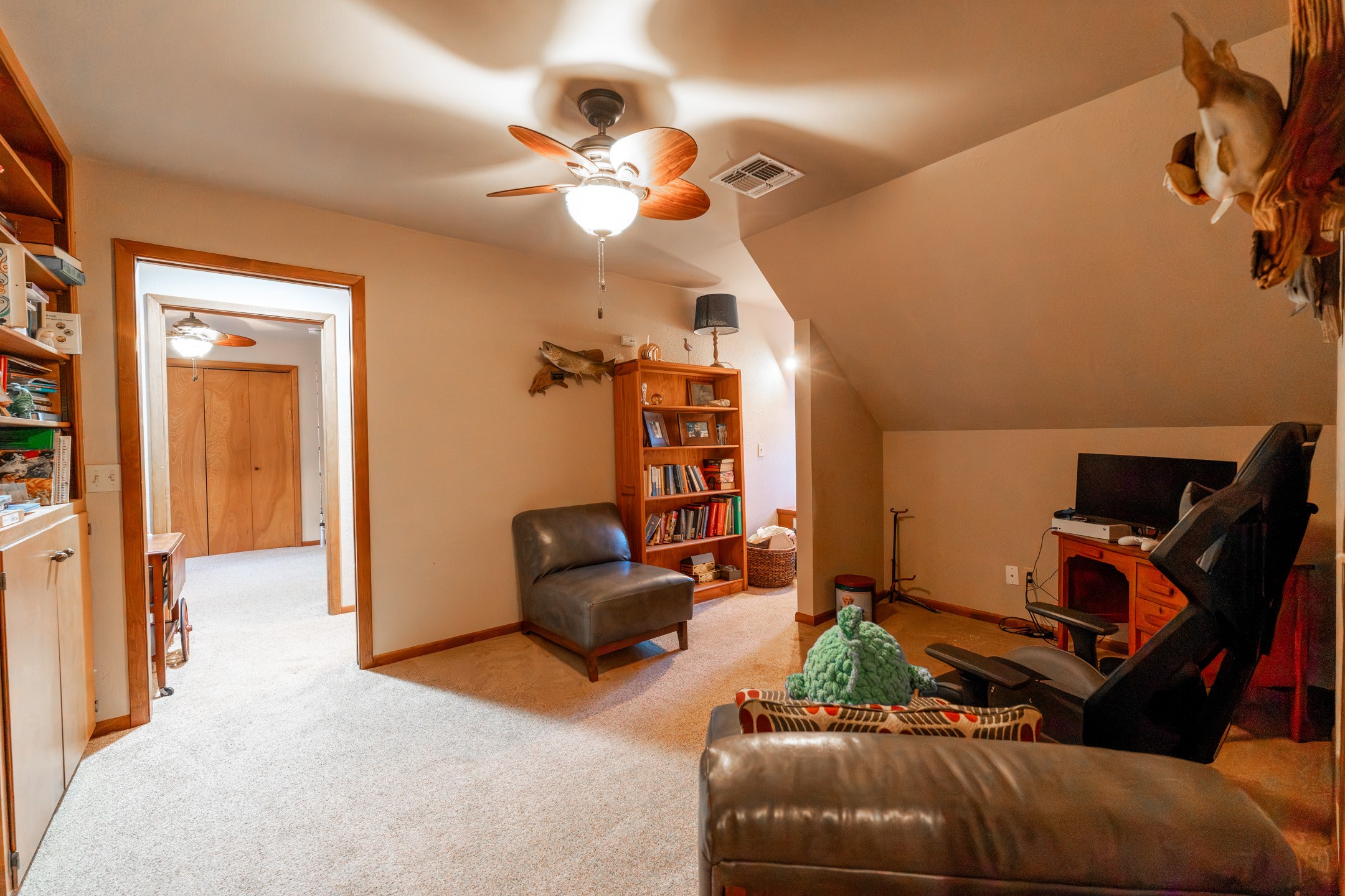 2210 Rita Street El Campo, TX 77437 - Photo 15 of 22 a bedroom with furniture and a chandelier