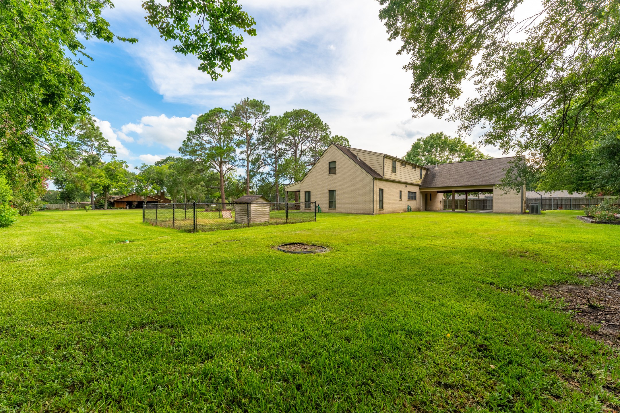 2210 Rita Street El Campo, TX 77437 - Photo 19 of 22 a view of a house with a big yard