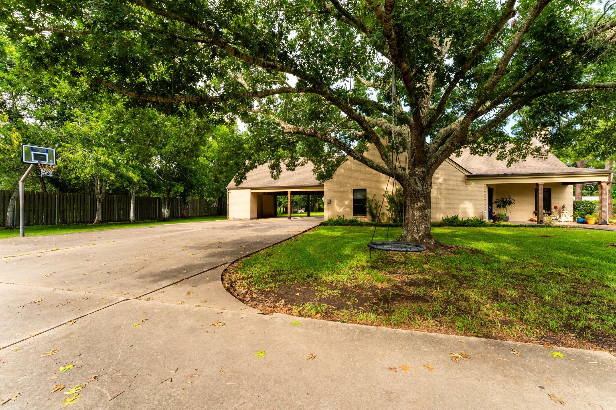 2210 Rita Street El Campo, TX 77437 - Photo 4 of 22 a front view of a house with a yard
