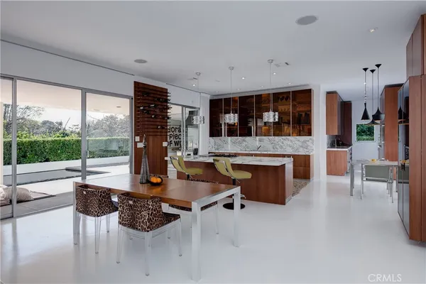 a bathroom with a sink a mirror and a shower