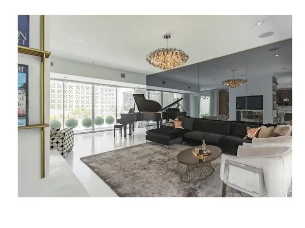 a view of balcony with furniture