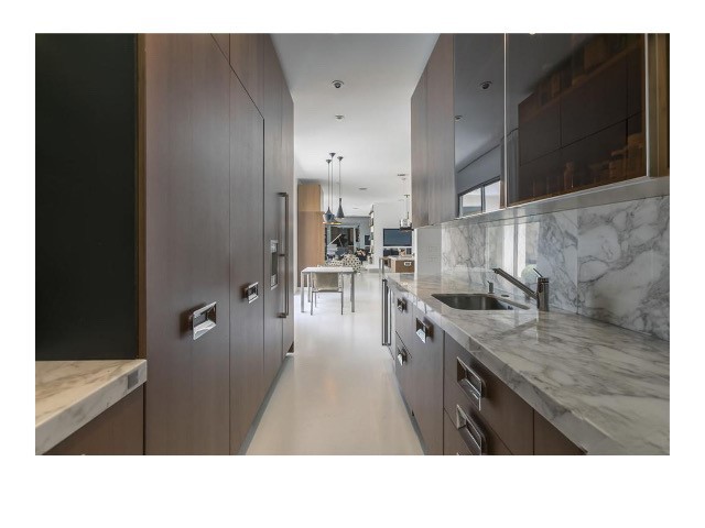 1030 San Rafael Lane Pasadena, CA 91105 - Photo 21 of 56 a open kitchen with stainless steel appliances granite countertop a sink stove and refrigerator