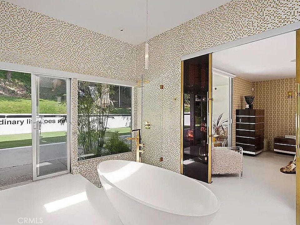 1030 San Rafael Lane Pasadena, CA 91105 - Photo 35 of 56 a bathroom with a tub and a view of bathroom