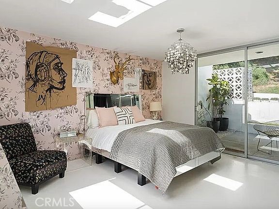 1030 San Rafael Lane Pasadena, CA 91105 - Photo 37 of 56 a bedroom with a bed couch and window