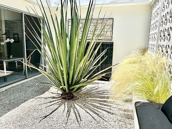 1030 San Rafael Lane Pasadena, CA 91105 - Photo 45 of 56 a view of entryway and hall with wooden floor