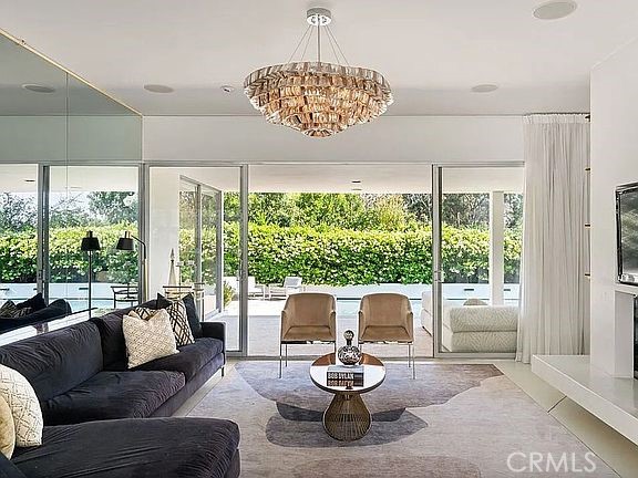 1030 San Rafael Lane Pasadena, CA 91105 - Photo 6 of 56 a living room with furniture and a large window