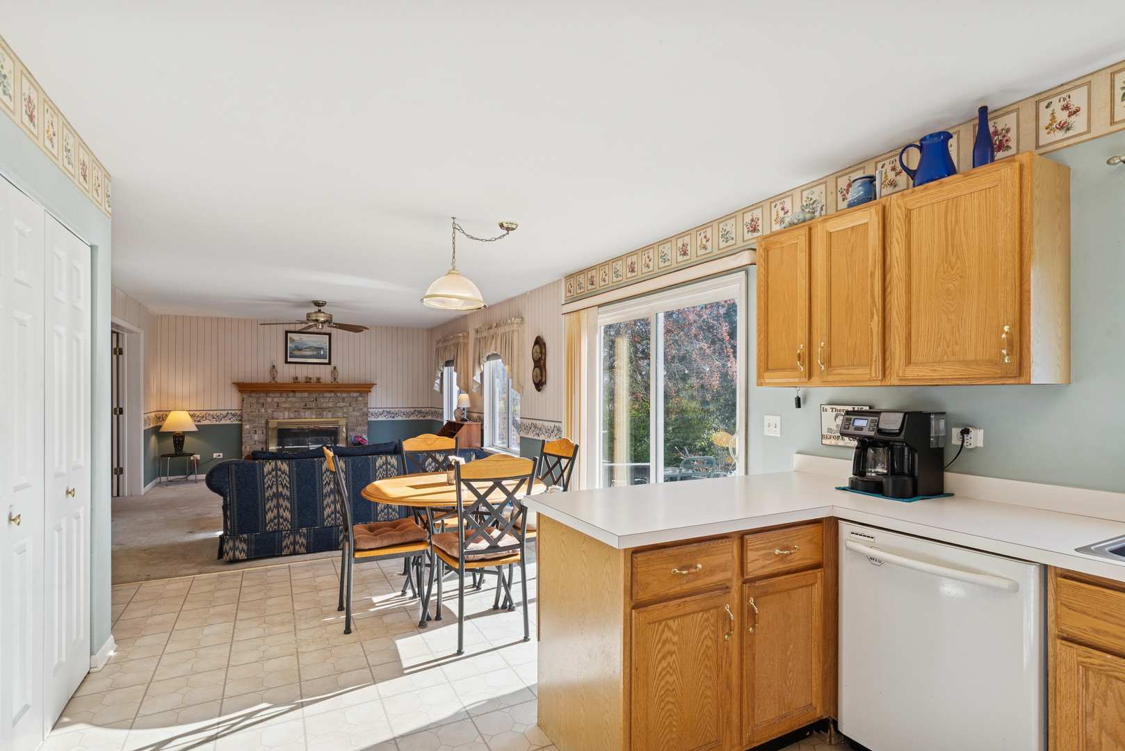 885 Charlton Road Lake Villa, IL 60046 - Photo 12 of 31 a kitchen with a sink cabinets and appliances