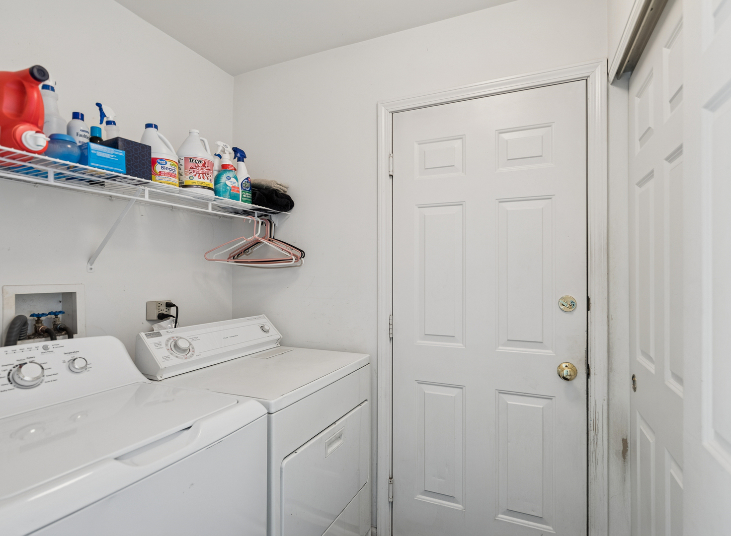 885 Charlton Road Lake Villa, IL 60046 - Photo 14 of 31 a view of storage and utility room with racks on the wall