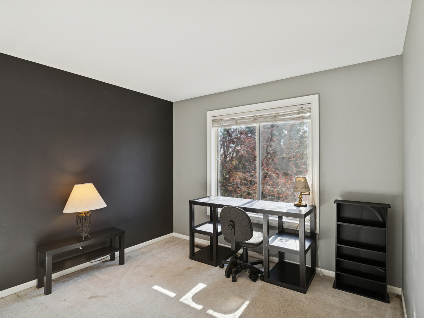 885 Charlton Road Lake Villa, IL 60046 - Photo 20 of 31 a view of a workspace with furniture and a window