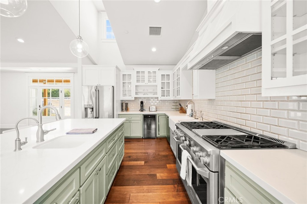 41260 De Anna Ranch Road Murrieta, CA 92562 - Photo 11 of 57 a kitchen with a stove sink and a refrigerator