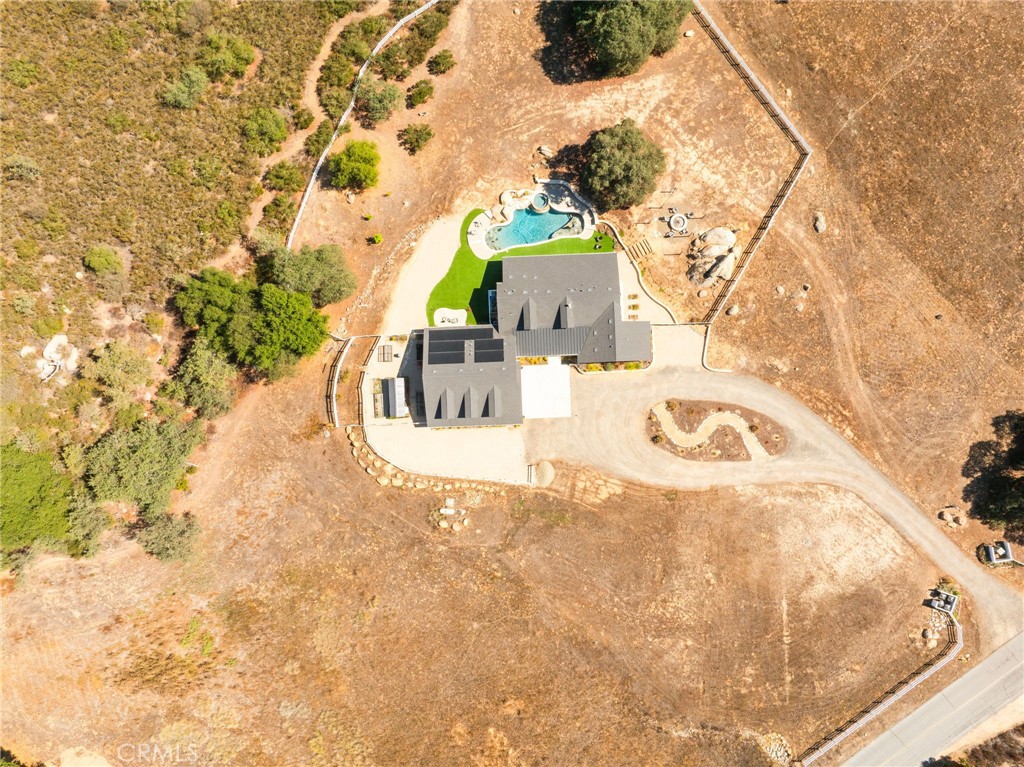 41260 De Anna Ranch Road Murrieta, CA 92562 - Photo 2 of 57 a view of a swimming pool with a yard