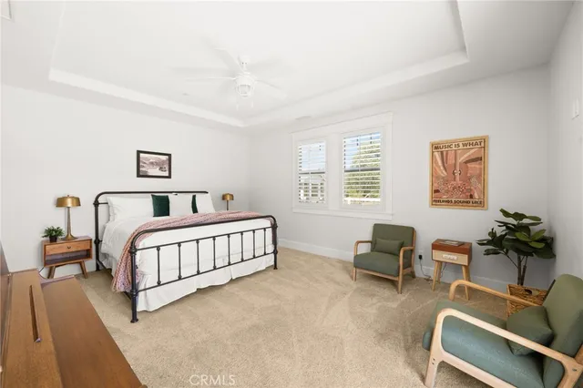 a bed room with furniture and a window