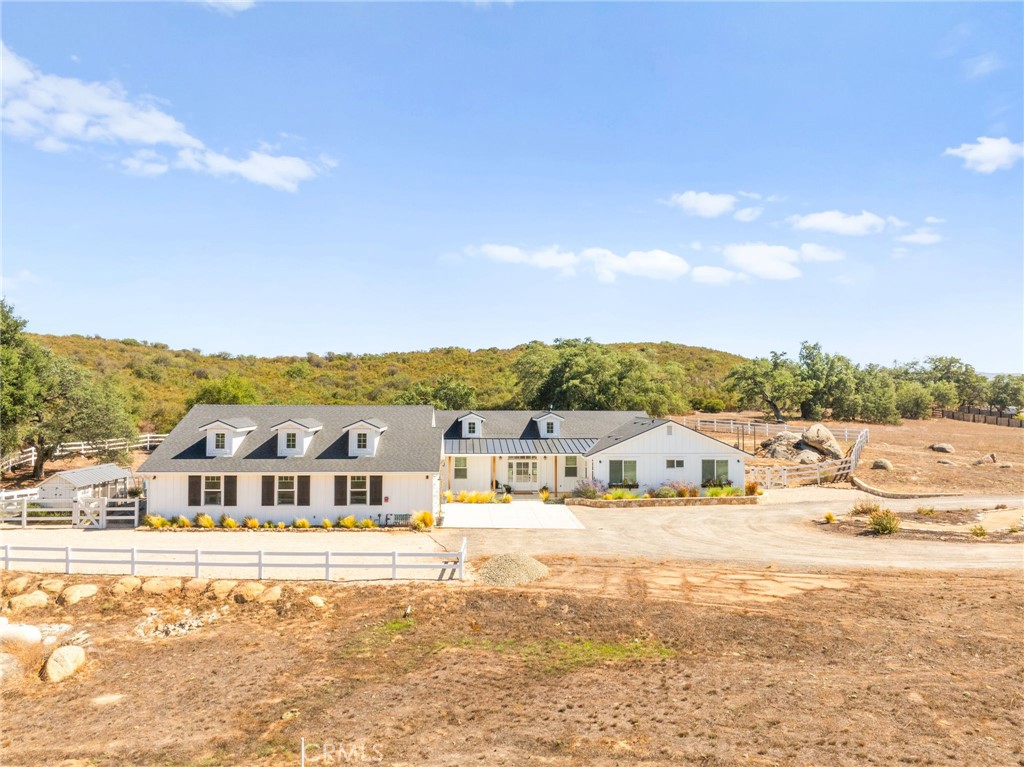 41260 De Anna Ranch Road Murrieta, CA 92562 - Photo 3 of 57 a view of a house with a big yard