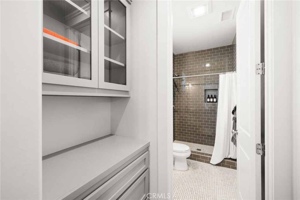 41260 De Anna Ranch Road Murrieta, CA 92562 - Photo 31 of 57 a bathroom with a toilet and a shower