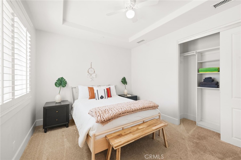 41260 De Anna Ranch Road Murrieta, CA 92562 - Photo 32 of 57 a bedroom with a bed and a window