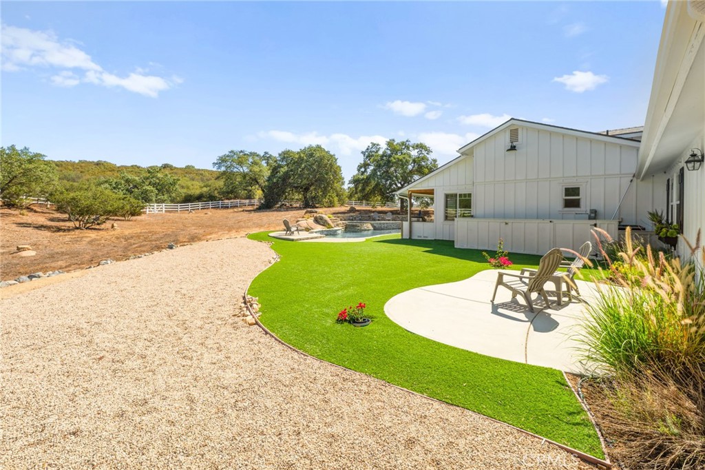 41260 De Anna Ranch Road Murrieta, CA 92562 - Photo 38 of 57 a view of a swimming pool with a patio