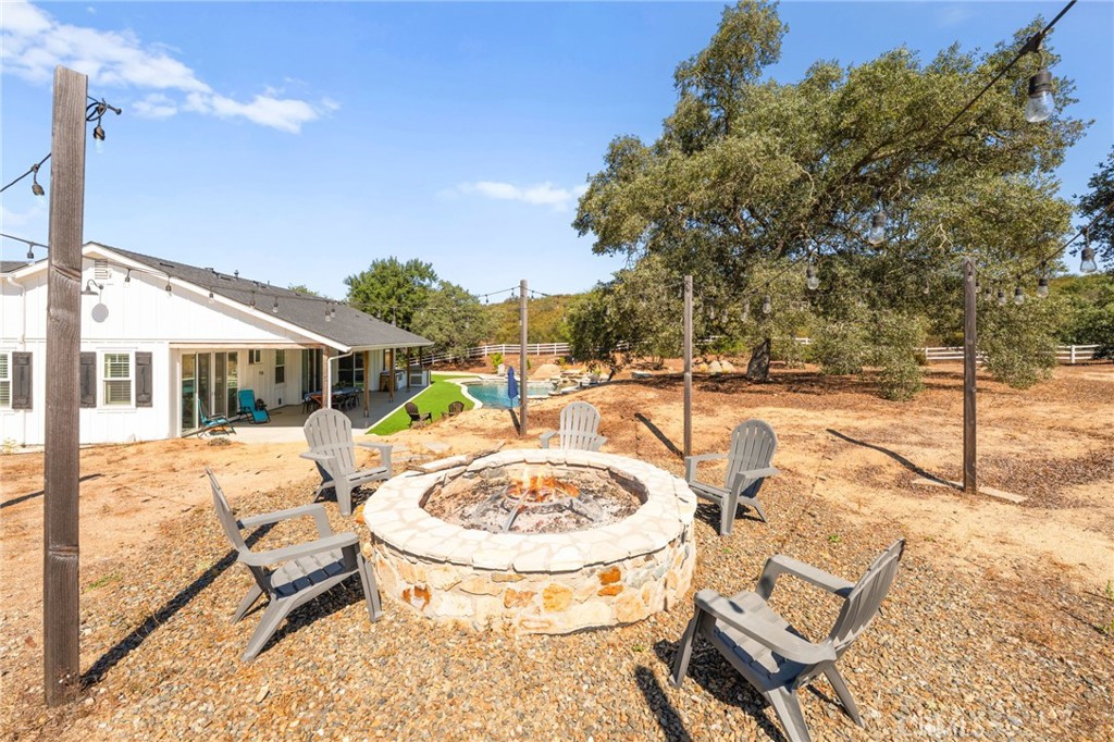 41260 De Anna Ranch Road Murrieta, CA 92562 - Photo 42 of 57 a view of a swimming pool with a patio