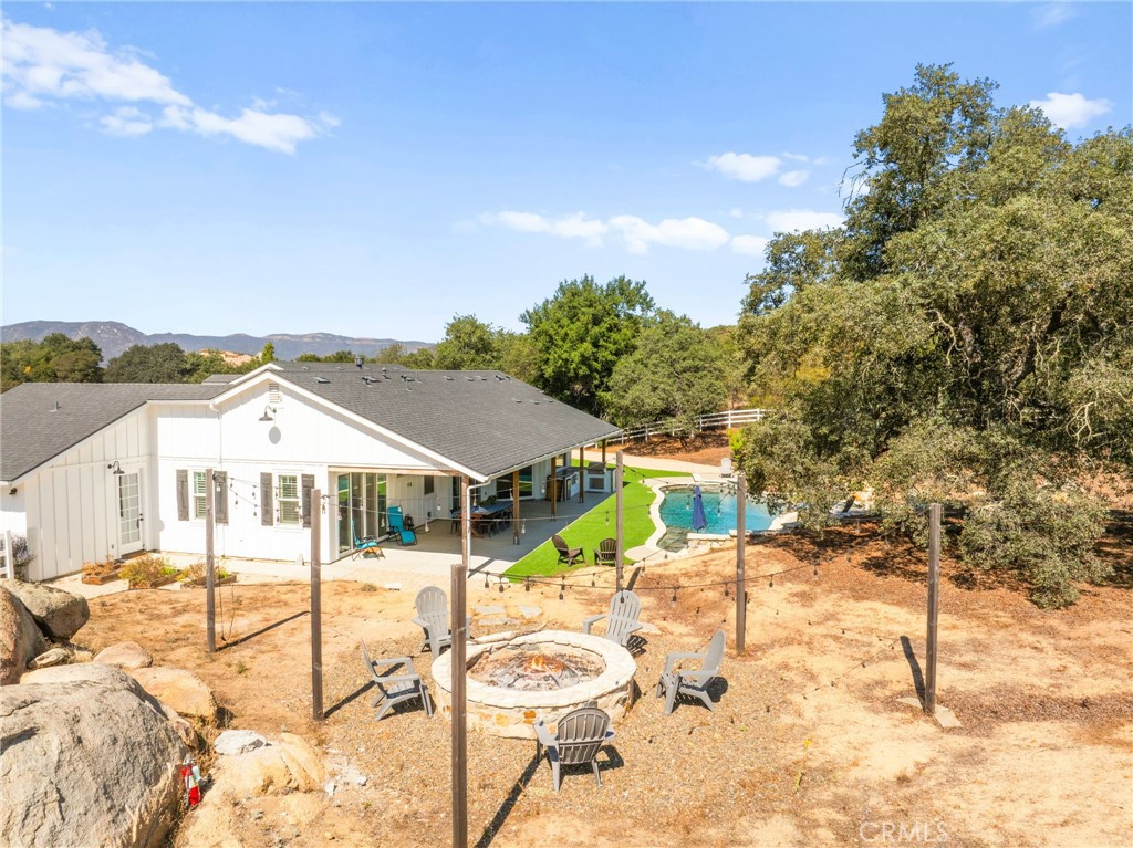 41260 De Anna Ranch Road Murrieta, CA 92562 - Photo 56 of 57 a view of a house with a backyard
