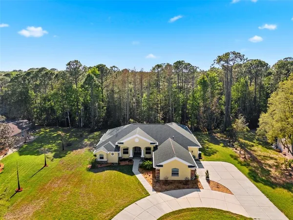 $599,990 | 4453 Lake In The Woods Drive, Spring Hill, FL 34607
