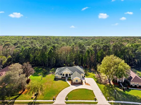 $599,990 | 4453 Lake In The Woods Drive, Spring Hill, FL 34607