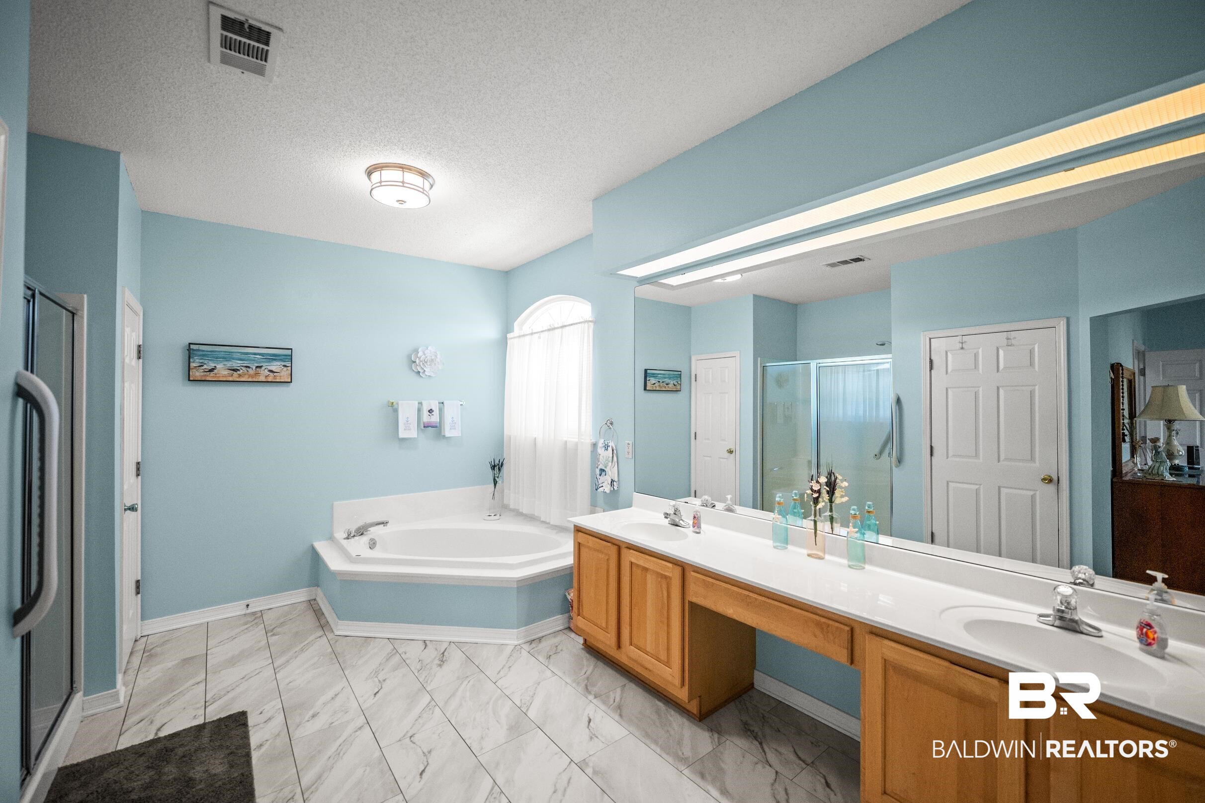 22355 East County Road 12 Foley, AL 36535 - Photo 30 of 54 Bathroom featuring double vanity, a textured ceiling, a shower stall, light marble finish floors, and a bath