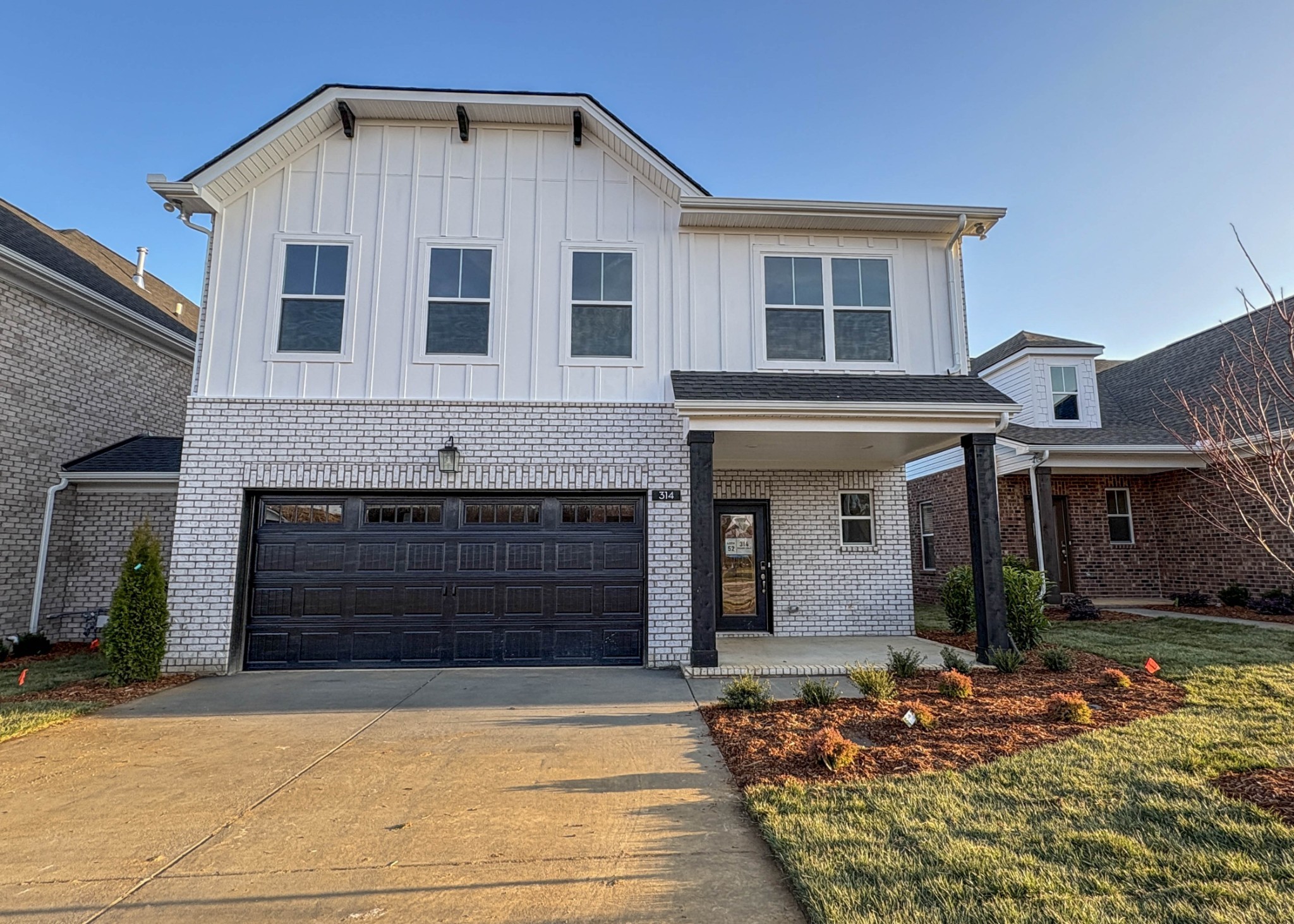 314 Booker Drive Gallatin, TN 37066 - Photo 1 of 30 a front view of a house with yard