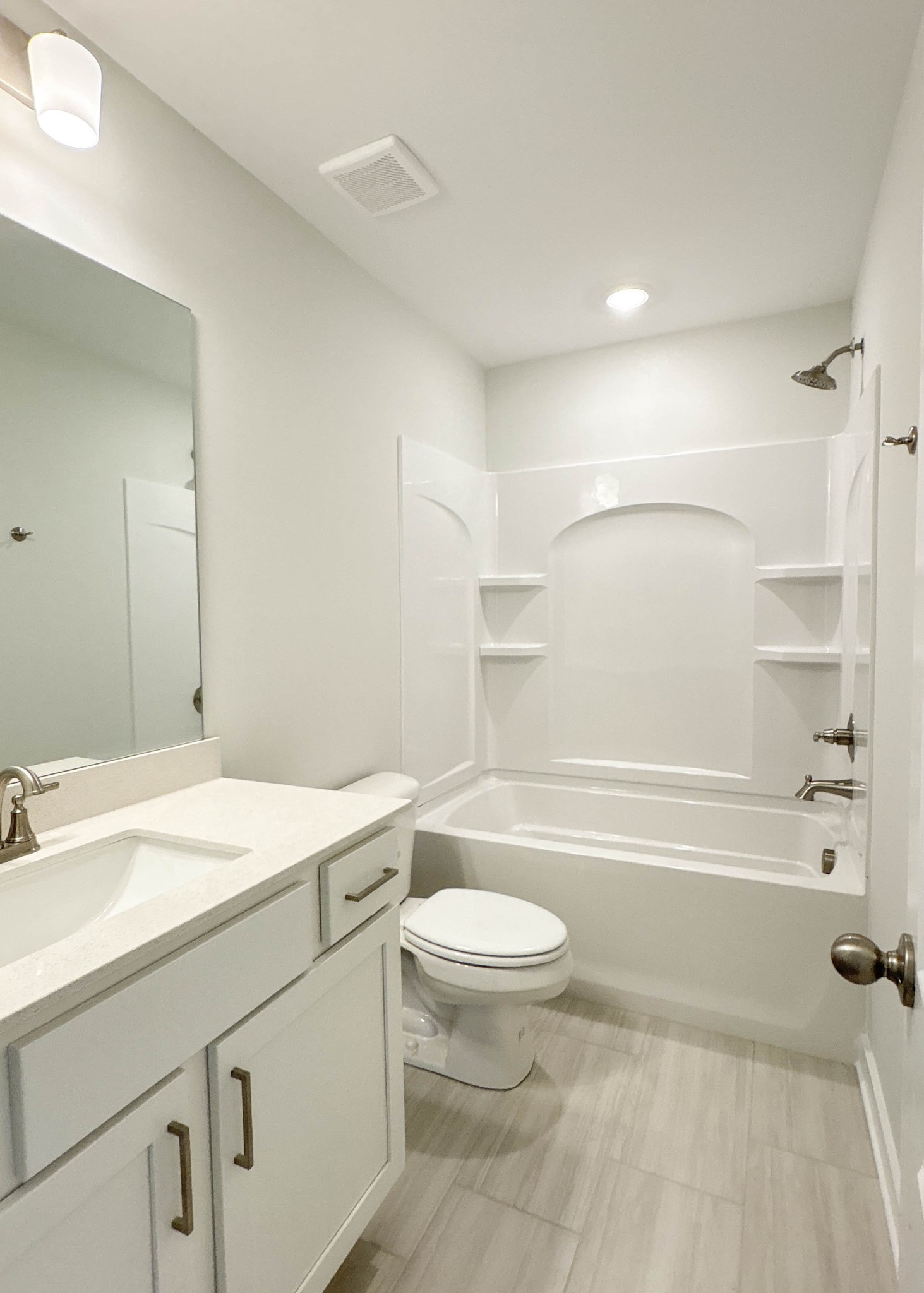 314 Booker Drive Gallatin, TN 37066 - Photo 23 of 30 a bathroom with a sink toilet vanity and shower