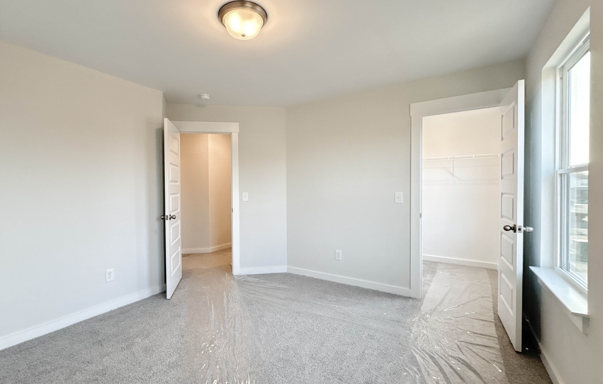 314 Booker Drive Gallatin, TN 37066 - Photo 27 of 30 an empty room with wooden floor and windows