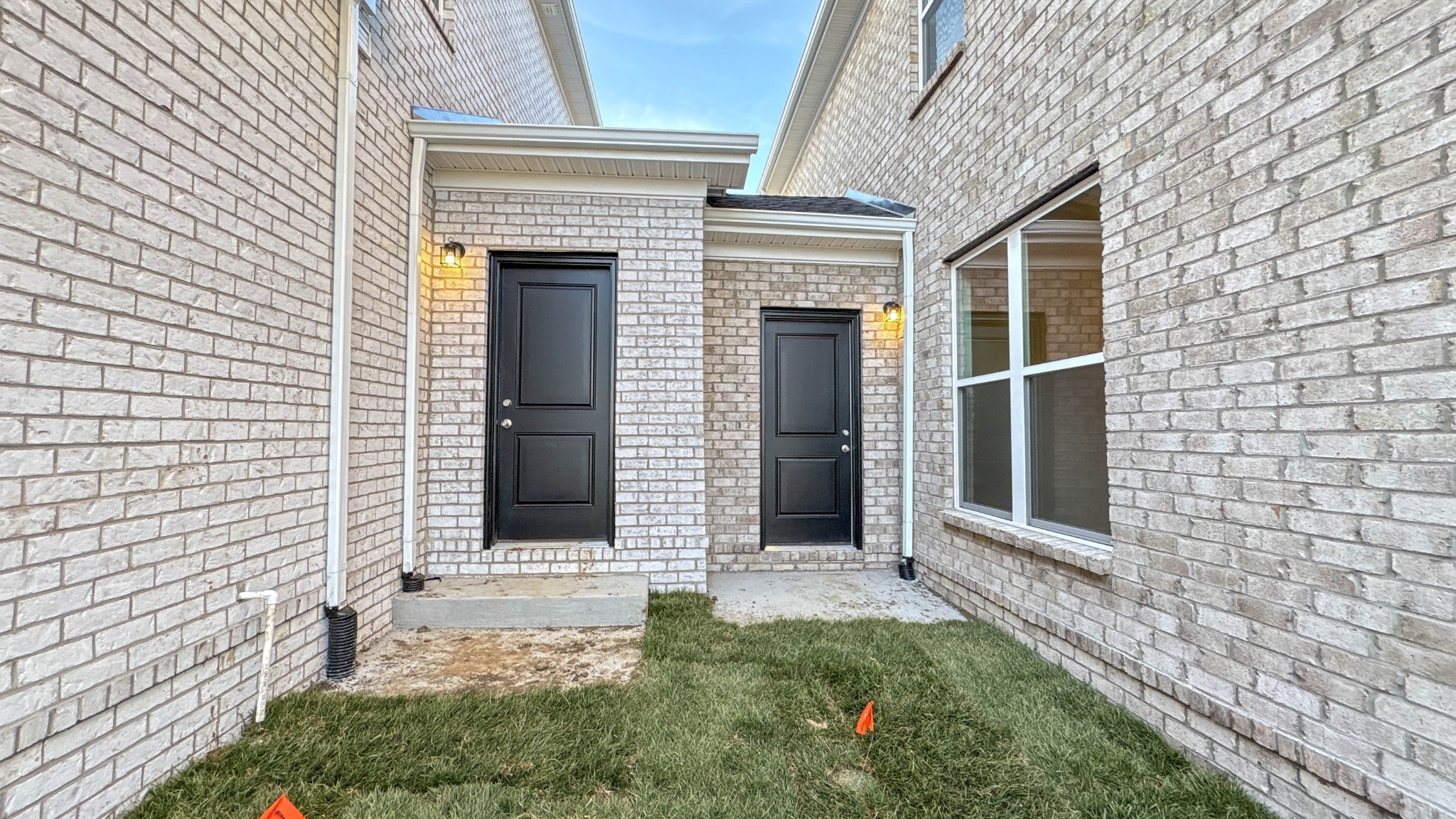 314 Booker Drive Gallatin, TN 37066 - Photo 7 of 30 a front view of a house with a garden