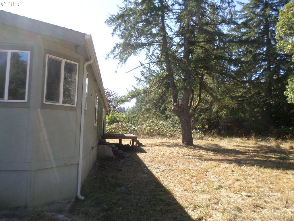 15063 South Hattan Road Oregon City, OR 97045 - Photo 3 of 25 a view of backyard of house