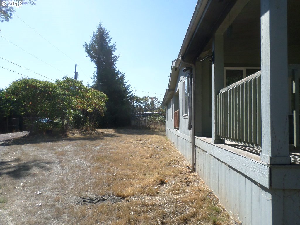 15063 South Hattan Road Oregon City, OR 97045 - Photo 4 of 25 a view of backyard of the house