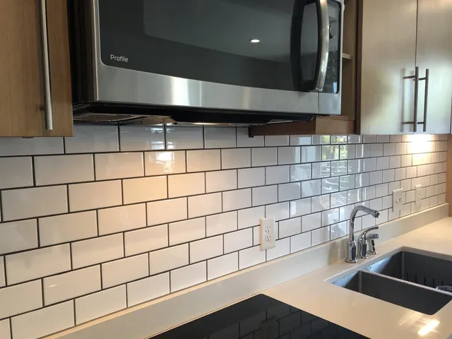 a bathroom with a sink and a shower