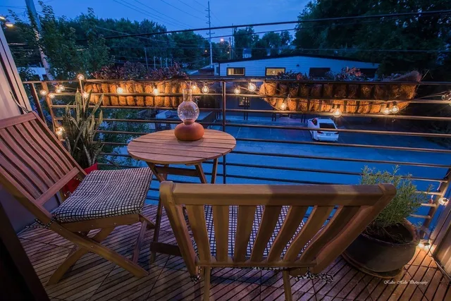 a view of a backyard with sitting area