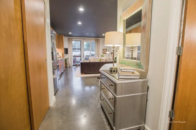 a kitchen with a stove and a refrigerator