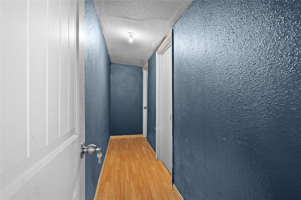 4115 Peachtree Road Balch Springs, TX 75180 - Photo 19 of 24 a bathroom with a bathtub and shower