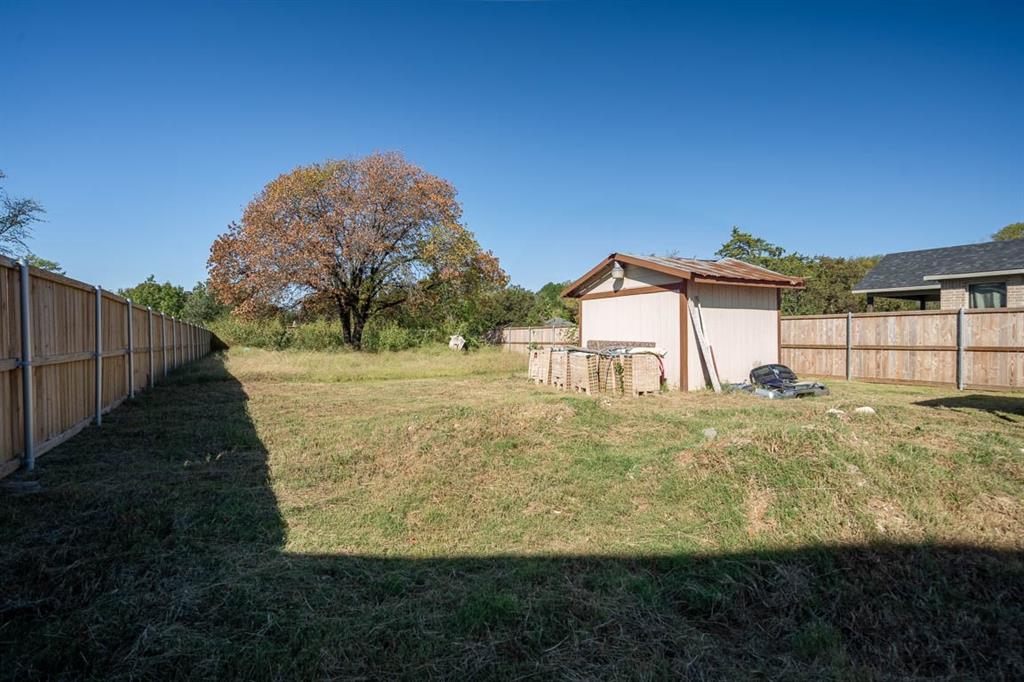 4115 Peachtree Road Balch Springs, TX 75180 - Photo 24 of 24 a view of a backyard